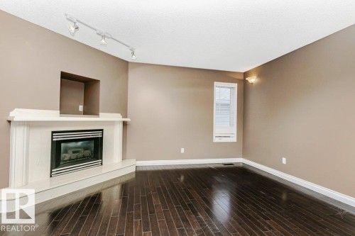 15827 133 Street, Edmonton, AB - Indoor Photo Showing Other Room With Fireplace
