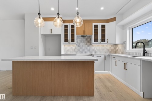 Image quality insufficient for description - 45 River Birch, St. Albert, AB - Indoor Photo Showing Kitchen With Upgraded Kitchen