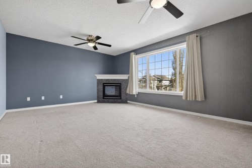 8915 7 Avenue, Edmonton, AB - Indoor Photo Showing Other Room With Fireplace