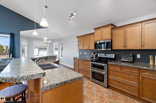 28 Woods Place, Leduc, AB - Indoor Photo Showing Kitchen With Double Sink