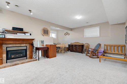 28 Woods Place, Leduc, AB - Indoor With Fireplace