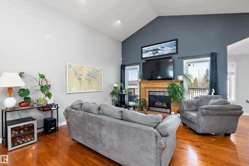 28 Woods Place, Leduc, AB - Indoor Photo Showing Living Room With Fireplace