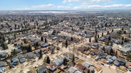 Expansive residential area featuring numerous single-family homes, mature trees, and paved roads - 119 Dorchester Drive, St. Albert, AB - Outdoor With View