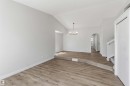 Interior living space with wood-finish flooring, vaulted ceiling, and recessed lighting - 119 Dorchester Drive, St. Albert, AB  - Indoor Photo Showing Other Room 