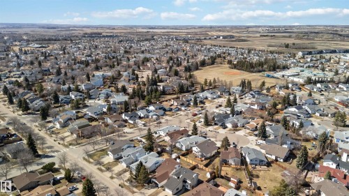 Expansive aerial perspective showcasing a residential neighborhood with numerous single-story and two-story homes - 119 Dorchester Drive, St. Albert, AB - Outdoor With View