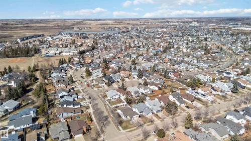 Residential neighborhood featuring numerous single-family homes, curvilinear streets, and mature trees - 119 Dorchester Drive, St. Albert, AB - Outdoor With View