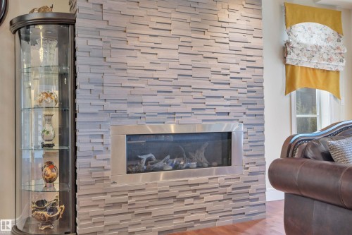 1624 Ainslie Lane, Edmonton, AB - Indoor Photo Showing Living Room With Fireplace