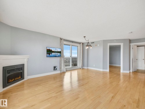 602 10649 Saskatchewan Drive, Edmonton, AB - Indoor Photo Showing Living Room With Fireplace
