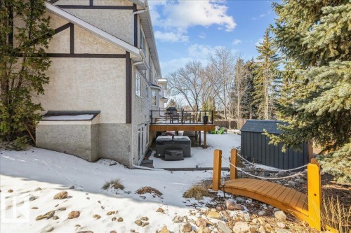 The property features a multi-level exterior with stucco siding and dark trim accents - 954 Rice Road, Edmonton, AB - Outdoor