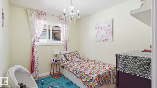 Room with light-colored walls and a window - 13533 119 Street, Edmonton, AB - Indoor Photo Showing Bedroom