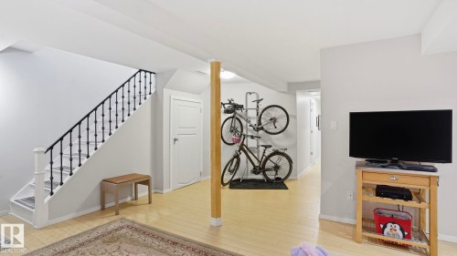 Finished lower level featuring light wood-finish flooring, white walls, and recessed lighting - 13533 119 Street, Edmonton, AB - Indoor Photo Showing Other Room