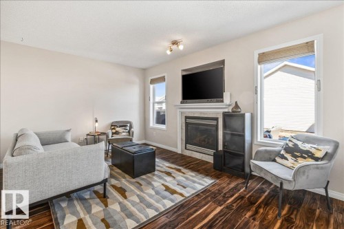 9310 Simpson Drive, Edmonton, AB - Indoor Photo Showing Living Room With Fireplace