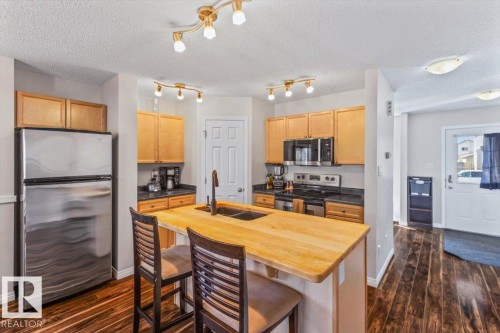 9310 Simpson Drive, Edmonton, AB - Indoor Photo Showing Kitchen With Double Sink
