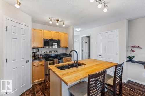 9310 Simpson Drive, Edmonton, AB - Indoor Photo Showing Kitchen With Double Sink