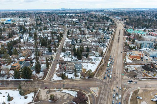 Aerial view showcasing the residential neighbourhood with numerous trees and a main thoroughfare - 2 Sturgeon Road, St. Albert, AB - Outdoor With View