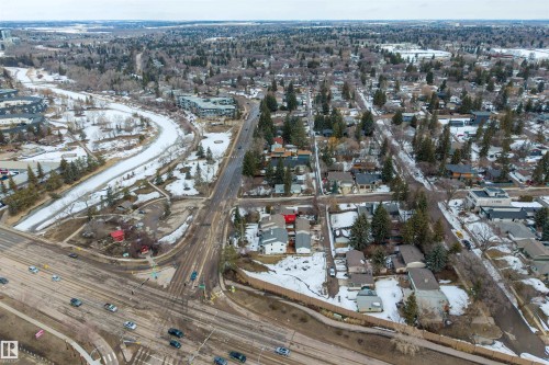 This aerial view showcases a vibrant community with a mix of residential properties and natural landscapes - 2 Sturgeon Road, St. Albert, AB - Outdoor With View