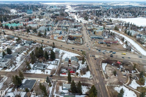 Aerial view of the surrounding community, featuring residential properties, commercial buildings, and roadways - 2 Sturgeon Road, St. Albert, AB - Outdoor With View