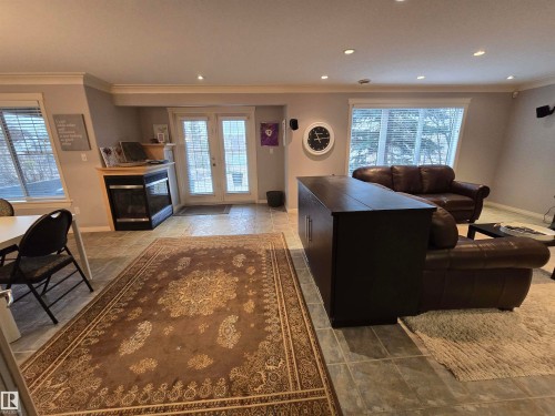 1668 Glastonbury Boulevard, Edmonton, AB - Indoor Photo Showing Living Room With Fireplace