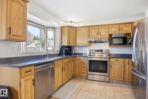 7220 157 Avenue, Edmonton, AB - Indoor Photo Showing Kitchen With Double Sink
