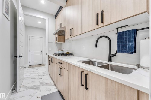 3729 42 Avenue, Beaumont, AB - Indoor Photo Showing Kitchen With Double Sink With Upgraded Kitchen