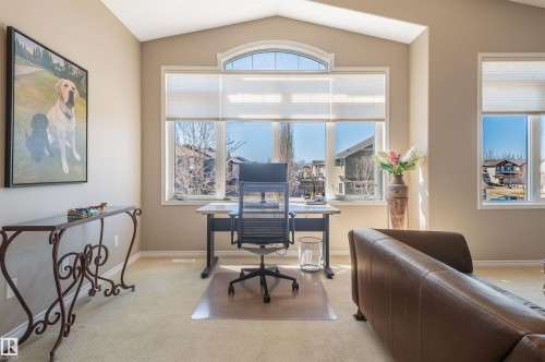 Vaulted ceiling room featuring extensive natural light from multiple windows - 121 Ellington Crescent, St. Albert, AB - Indoor Photo Showing Office