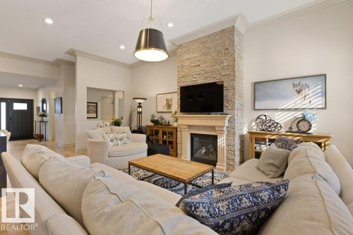 68 Enchanted Way, St. Albert, AB - Indoor Photo Showing Living Room With Fireplace