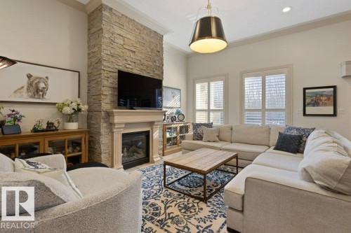 68 Enchanted Way, St. Albert, AB - Indoor Photo Showing Living Room With Fireplace