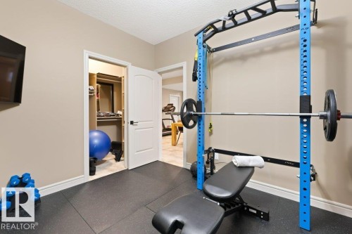 68 Enchanted Way, St. Albert, AB - Indoor Photo Showing Gym Room