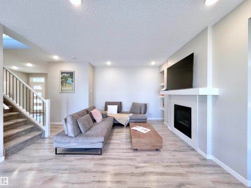 17828 9 Avenue, Edmonton, AB - Indoor Photo Showing Living Room With Fireplace