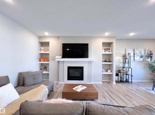 17828 9 Avenue, Edmonton, AB - Indoor Photo Showing Living Room With Fireplace
