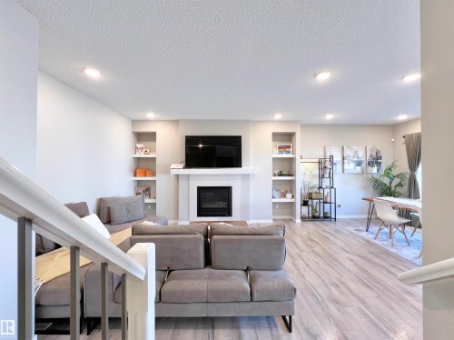 17828 9 Avenue, Edmonton, AB - Indoor Photo Showing Living Room With Fireplace