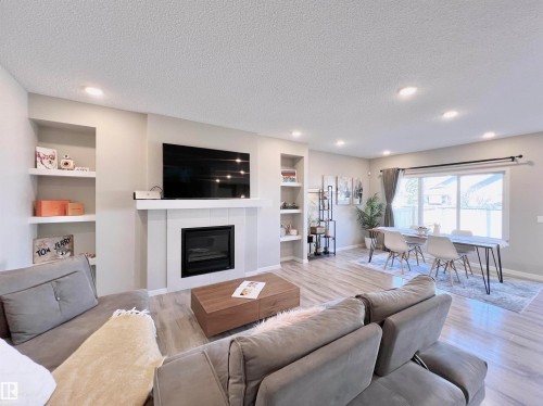 17828 9 Avenue, Edmonton, AB - Indoor Photo Showing Living Room With Fireplace
