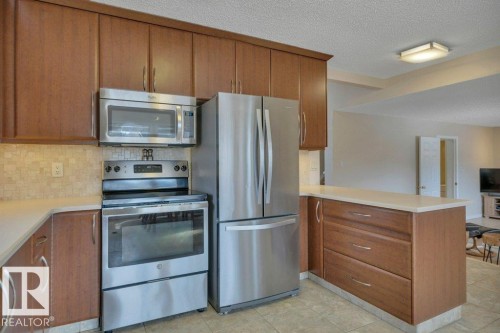 158 Rhatigan Road E, Edmonton, AB - Indoor Photo Showing Kitchen With Stainless Steel Kitchen