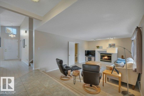 158 Rhatigan Road E, Edmonton, AB - Indoor With Fireplace