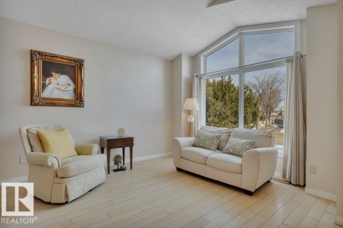 158 Rhatigan Road E, Edmonton, AB - Indoor Photo Showing Living Room