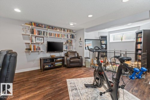 Spacious lower-level area with wood-finish flooring - 1130 Westerra Way, Stony Plain, AB - Indoor