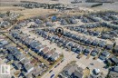 Residential neighborhood with a grid street pattern and uniform detached homes - 1130 Westerra Way, Stony Plain, AB  - Outdoor With View 