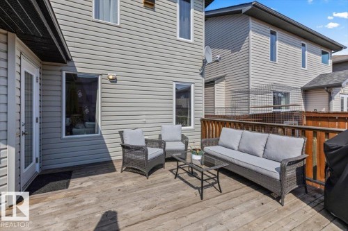 Spacious wooden deck featuring a wooden railing and direct exterior access - 1130 Westerra Way, Stony Plain, AB - Outdoor With Deck Patio Veranda With Exterior