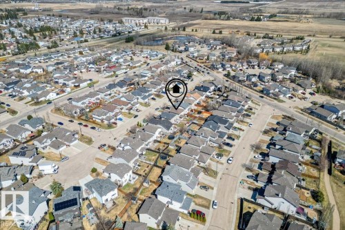Aerial view showcasing a residential neighborhood with numerous single-family homes and paved streets - 1130 Westerra Way, Stony Plain, AB - Outdoor With View