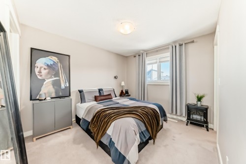 Neutral wall tones with carpeted flooring - 115 401 Southfork Drive, Leduc, AB - Indoor Photo Showing Bedroom