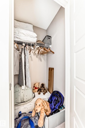 Closet space featuring a wire shelving system and hanging rod - 115 401 Southfork Drive, Leduc, AB - Indoor With Storage