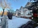 Multi-level facade featuring varied window styles, including arched and bay windows - 10905 74 Avenue, Edmonton, AB  - Outdoor 