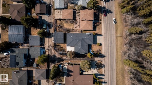 Aerial view of a residential street with mature trees and established properties - 4204 Aspen Drive E, Edmonton, AB - Outdoor With View