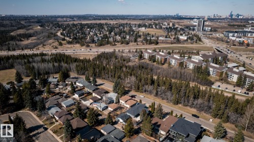 Aerial perspective showcasing a residential area with varied housing types - 4204 Aspen Drive E, Edmonton, AB - Outdoor With View