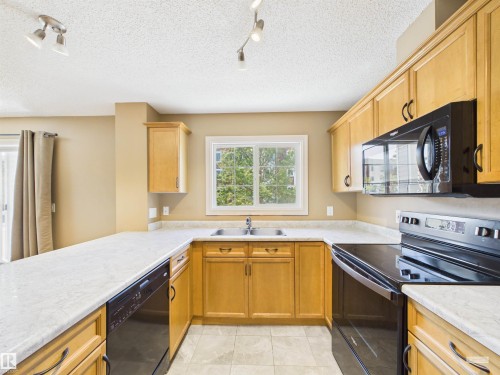 208 4403 23 Street, Edmonton, AB - Indoor Photo Showing Kitchen With Double Sink