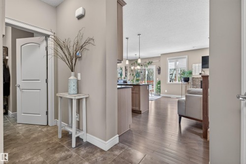 Entryway featuring tile flooring and a light neutral paint scheme - 2313 Sparrow Crescent, Edmonton, AB - Indoor Photo Showing Other Room
