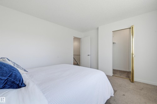 Carpeted interior space featuring white walls and a white ceiling - 8043 178 Street, Edmonton, AB - Indoor Photo Showing Bedroom