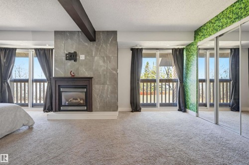 139 Wolf Willow Crescent, Edmonton, AB - Indoor Photo Showing Living Room With Fireplace