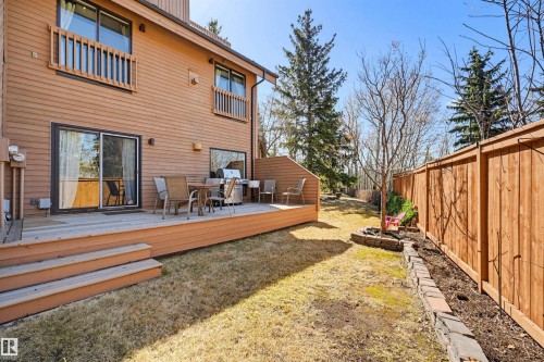 Spacious wooden deck with multiple steps and sliding glass door access - 139 Wolf Willow Crescent, Edmonton, AB - Outdoor With Deck Patio Veranda With Exterior