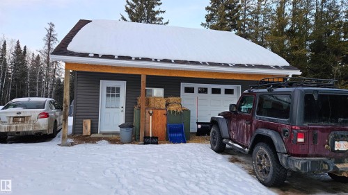 26x26 Oversized garage with in floor heat, 2 overhead doors and floor drain - 58513 Range Road 231, Rural Thorhild County, AB - Outdoor